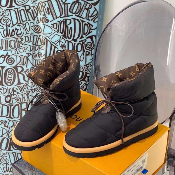Nuovi stivali in piuma Louis Vuitton