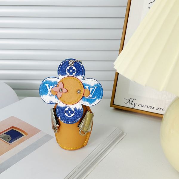 repliche,replica,perfette,siti di,affidabili,migliori siti,dove comprare,1:1,scarpe da ginnastica 23/Portachiavi bambola Louis Vuitton Girasole/MP3069