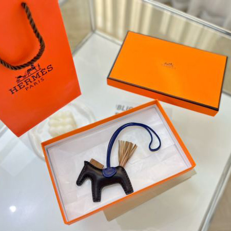 repliche,replica,perfette,siti di,affidabili,migliori siti,dove comprare,1:1,scarpe da ginnastica 23/Ciondolo borsa Hermes a forma di cavallino