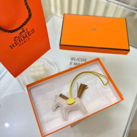repliche,replica,perfette,siti di,affidabili,migliori siti,dove comprare,1:1,scarpe da ginnastica 23/Ciondolo borsa Hermes a forma di cavallino
