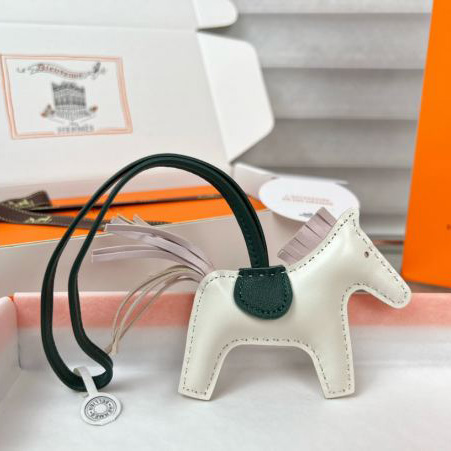 repliche,replica,perfette,siti di,affidabili,migliori siti,dove comprare,1:1,scarpe da ginnastica 23/Ciondolo borsa Hermes a forma di cavallino