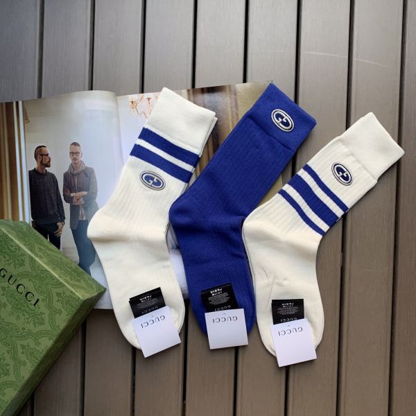 repliche,replica,perfette,siti di,affidabili,migliori siti,dove comprare,1:1,scarpe da ginnastica 23/3 paia di nuovi calzini a tubo medio in cotone a righe blu per lo sport e il tempo libero di Gucci