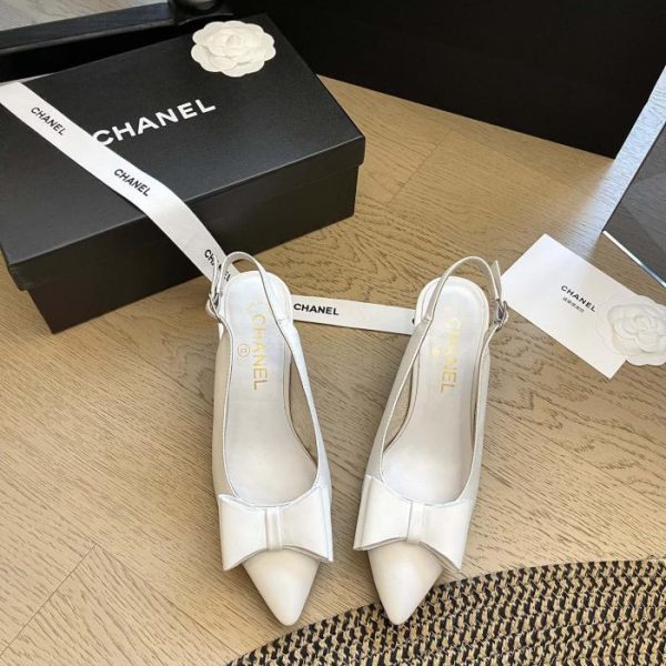 repliche,replica,perfette,siti di,affidabili,migliori siti,dove comprare,1:1,scarpe da ginnastica Décolleté Chanel 24P con fiocco in strass