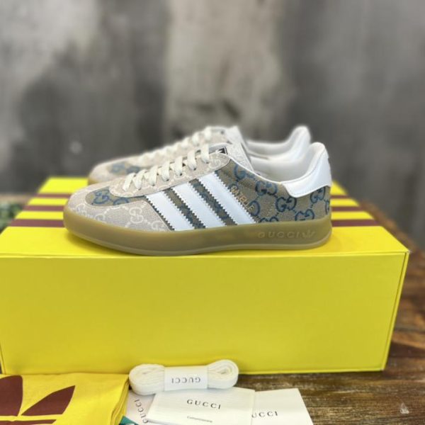 repliche,replica,perfette,siti di,affidabili,migliori siti,dove comprare,1:1,scarpe da ginnastica Versione top delle sneakers Gazelle congiunte adidas x Gucci