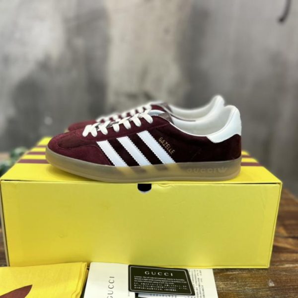 repliche,replica,perfette,siti di,affidabili,migliori siti,dove comprare,1:1,scarpe da ginnastica Versione top delle sneakers Gazelle congiunte adidas x Gucci