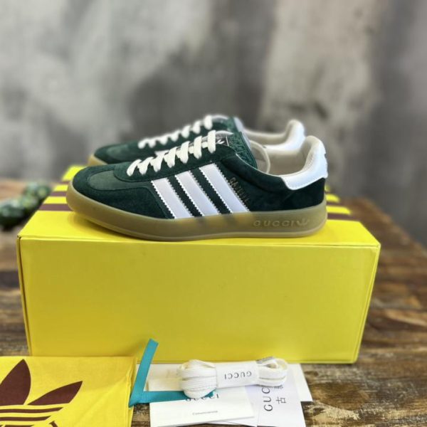 repliche,replica,perfette,siti di,affidabili,migliori siti,dove comprare,1:1,scarpe da ginnastica Versione top delle sneakers Gazelle congiunte adidas x Gucci