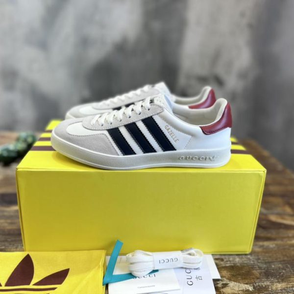 repliche,replica,perfette,siti di,affidabili,migliori siti,dove comprare,1:1,scarpe da ginnastica Versione top delle sneakers Gazelle congiunte adidas x Gucci