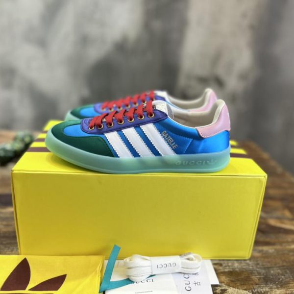 repliche,replica,perfette,siti di,affidabili,migliori siti,dove comprare,1:1,scarpe da ginnastica Versione top delle sneakers Gazelle congiunte adidas x Gucci