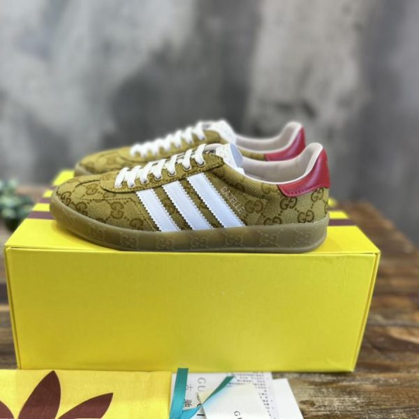repliche,replica,perfette,siti di,affidabili,migliori siti,dove comprare,1:1,scarpe da ginnastica Versione top delle sneakers Gazelle congiunte adidas x Gucci