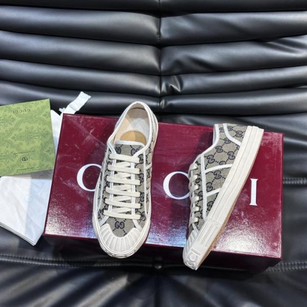 repliche,replica,perfette,siti di,affidabili,migliori siti,dove comprare,1:1,scarpe da ginnastica Sneakers della coppia Gucci in tela con stampa GG
