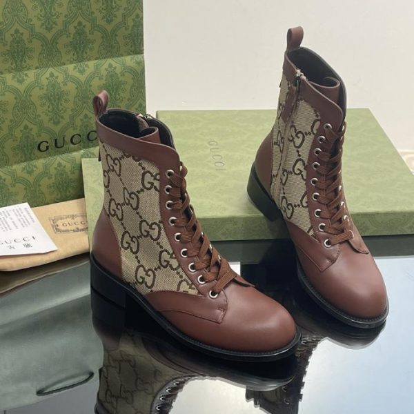 Stivali Martin stringati Gucci GG