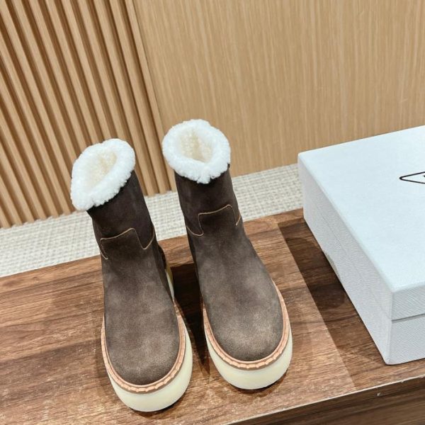repliche,replica,perfette,siti di,affidabili,migliori siti,dove comprare,1:1,scarpe da ginnastica Prada nuovi stivali con suola spessa con logo triangolo autunno e inverno