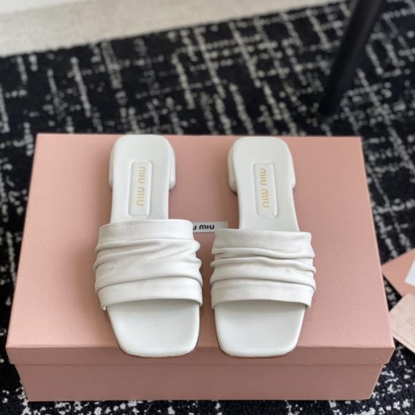repliche,replica,perfette,siti di,affidabili,migliori siti,dove comprare,1:1,scarpe da ginnastica [Versione top] Le ultime pantofole in denim di Miu Miu