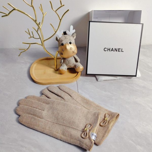 repliche,replica,perfette,siti di,affidabili,migliori siti,dove comprare,1:1,scarpe da ginnastica Guanti Chanel in lana nuova
