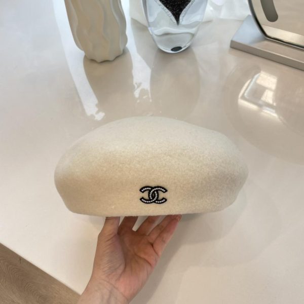 repliche,replica,perfette,siti di,affidabili,migliori siti,dove comprare,1:1,scarpe da ginnastica Berretto Chanel in lana nuova