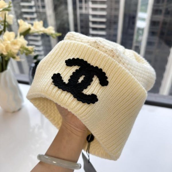 repliche,replica,perfette,siti di,affidabili,migliori siti,dove comprare,1:1,scarpe da ginnastica Cappello Chanel doppia C lavorato a maglia