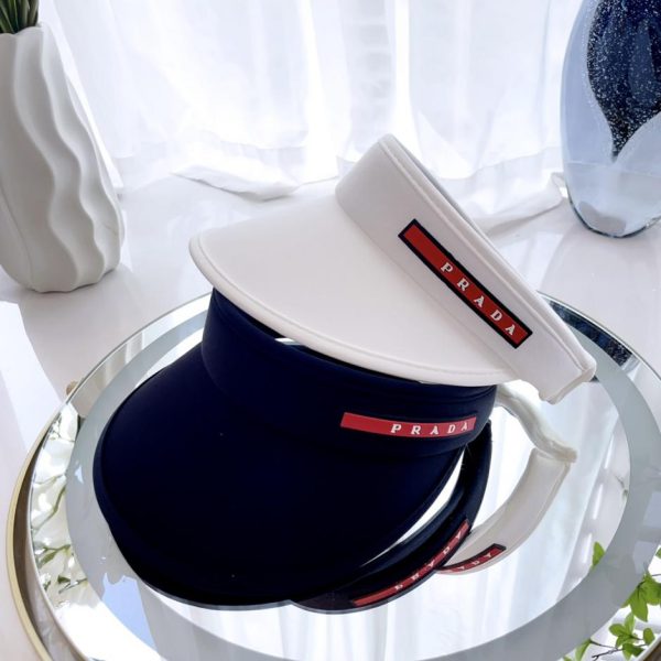 repliche,replica,perfette,siti di,affidabili,migliori siti,dove comprare,1:1,scarpe da ginnastica Il nuovo cappello a cilindro cavo in stile sportivo di Prada 猫 uguale per uomo e donna