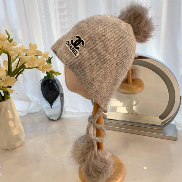repliche,replica,perfette,siti di,affidabili,migliori siti,dove comprare,1:1,scarpe da ginnastica Cappello di protezione per le orecchie con palla di pelo autunnale e invernale di Chanel