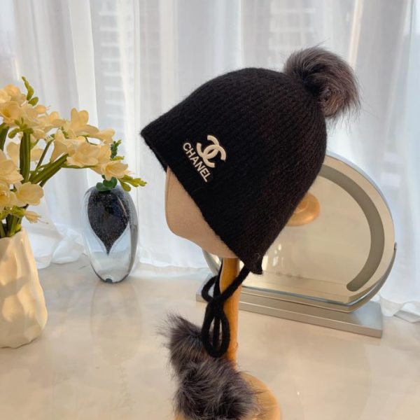 repliche,replica,perfette,siti di,affidabili,migliori siti,dove comprare,1:1,scarpe da ginnastica Cappello di protezione per le orecchie con palla di pelo autunnale e invernale di Chanel
