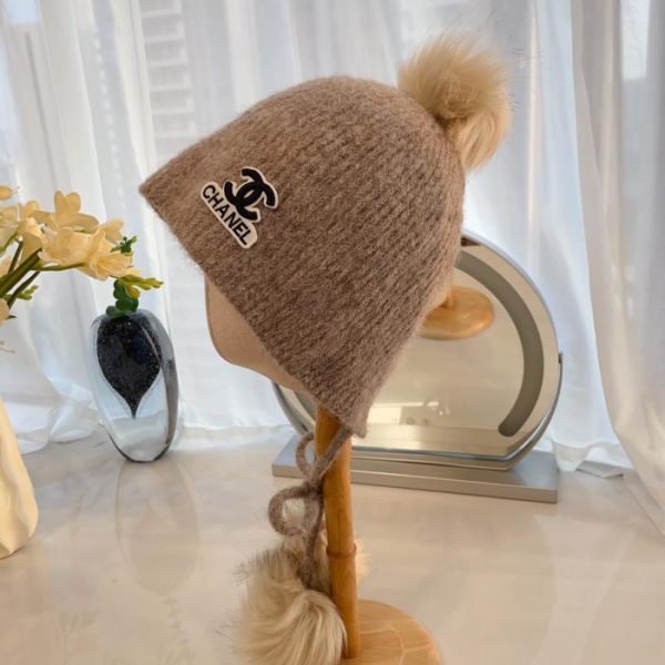 repliche,replica,perfette,siti di,affidabili,migliori siti,dove comprare,1:1,scarpe da ginnastica Cappello di protezione per le orecchie con palla di pelo autunnale e invernale di Chanel