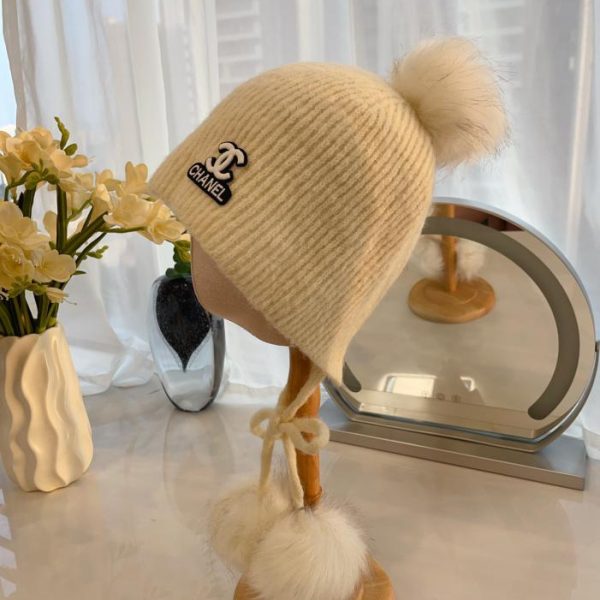 repliche,replica,perfette,siti di,affidabili,migliori siti,dove comprare,1:1,scarpe da ginnastica Cappello di protezione per le orecchie con palla di pelo autunnale e invernale di Chanel
