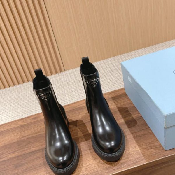 repliche,replica,perfette,siti di,affidabili,migliori siti,dove comprare,1:1,scarpe da ginnastica Stivali classici a triangolo Prada