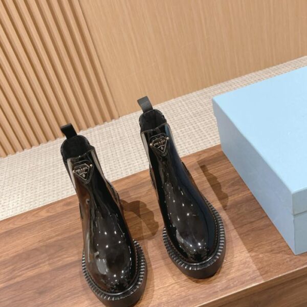 repliche,replica,perfette,siti di,affidabili,migliori siti,dove comprare,1:1,scarpe da ginnastica Prada nuovi stivaletti corti con logo a cinque punte