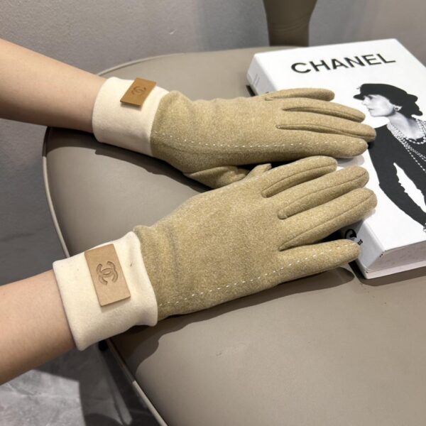 repliche,replica,perfette,siti di,affidabili,migliori siti,dove comprare,1:1,scarpe da ginnastica Guanti Chanel in lana nuova