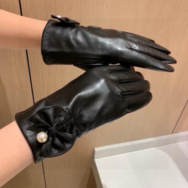 repliche,replica,perfette,siti di,affidabili,migliori siti,dove comprare,1:1,scarpe da ginnastica Guanti touch Chanel