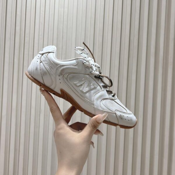 repliche,replica,perfette,siti di,affidabili,migliori siti,dove comprare,1:1,scarpe da ginnastica Coppia di sneakers Miu Miu x New Balance serie congiunta