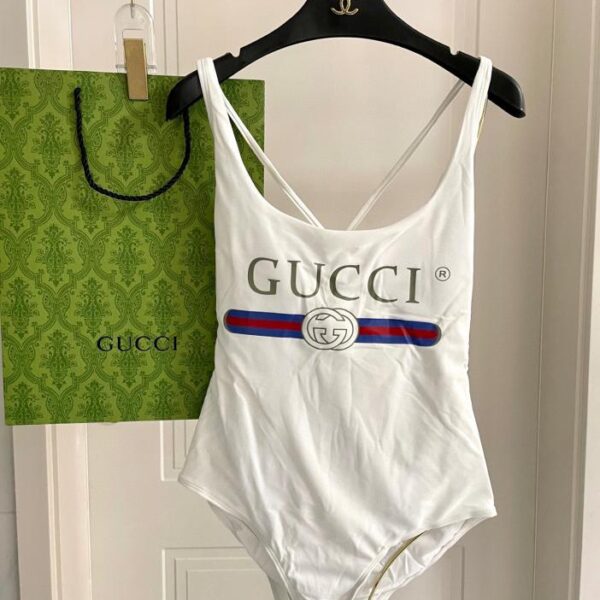 repliche,replica,perfette,siti di,affidabili,migliori siti,dove comprare,1:1,scarpe da ginnastica Nuovo costume intero Gucci