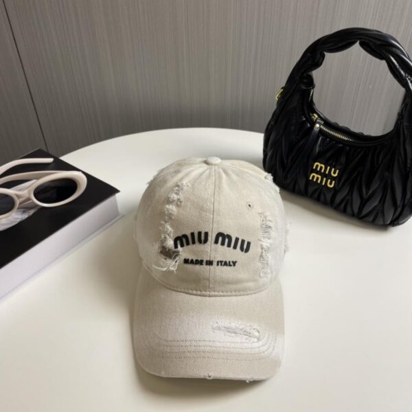 repliche,replica,perfette,siti di,affidabili,migliori siti,dove comprare,1:1,scarpe da ginnastica Nuovo berretto da baseball semplice di Miu Miu