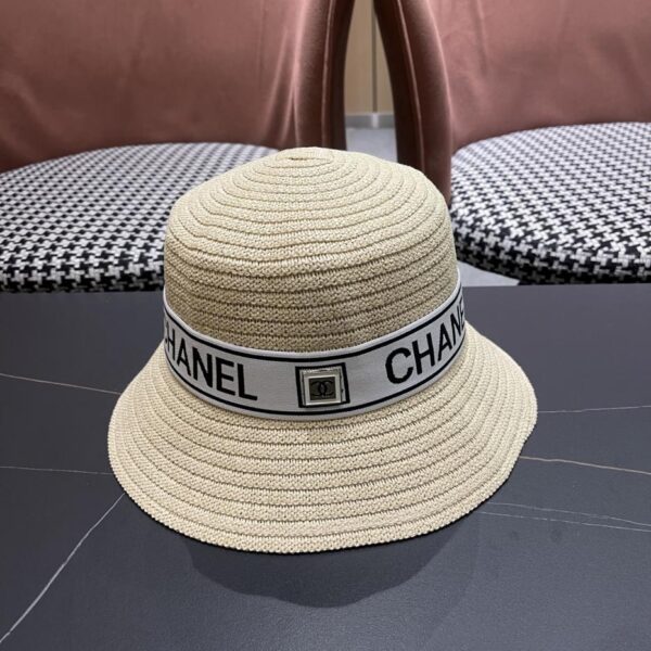 repliche,replica,perfette,siti di,affidabili,migliori siti,dove comprare,1:1,scarpe da ginnastica Cappello a secchiello traspirante estivo da donna Chanel a tesa larga con protezione solare, cappello di paglia da mare
