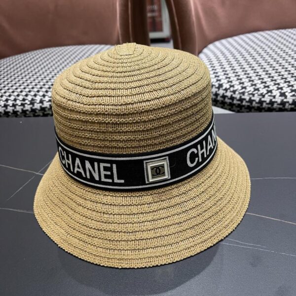 repliche,replica,perfette,siti di,affidabili,migliori siti,dove comprare,1:1,scarpe da ginnastica Cappello a secchiello traspirante estivo da donna Chanel a tesa larga con protezione solare, cappello di paglia da mare