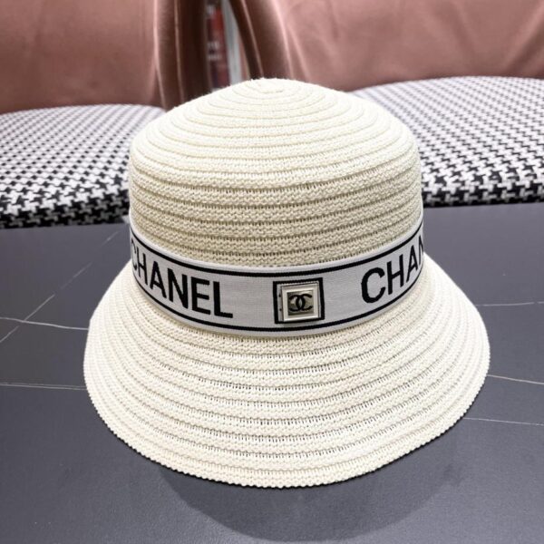 repliche,replica,perfette,siti di,affidabili,migliori siti,dove comprare,1:1,scarpe da ginnastica Cappello a secchiello traspirante estivo da donna Chanel a tesa larga con protezione solare, cappello di paglia da mare