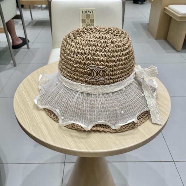 repliche,replica,perfette,siti di,affidabili,migliori siti,dove comprare,1:1,scarpe da ginnastica Cappello di paglia intrecciato in pizzo francese Chanel per cappello da pescatore estivo con visiera parasole a tesa larga da donna