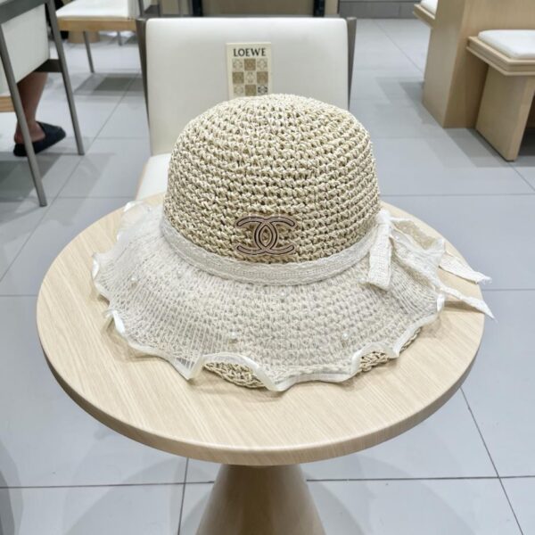 repliche,replica,perfette,siti di,affidabili,migliori siti,dove comprare,1:1,scarpe da ginnastica Cappello di paglia intrecciato in pizzo francese Chanel per cappello da pescatore estivo con visiera parasole a tesa larga da donna