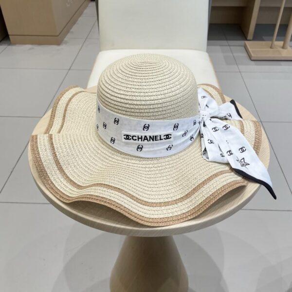 repliche,replica,perfette,siti di,affidabili,migliori siti,dove comprare,1:1,scarpe da ginnastica Cappello da sole a tesa ondulata con nastro di paglia Chanel