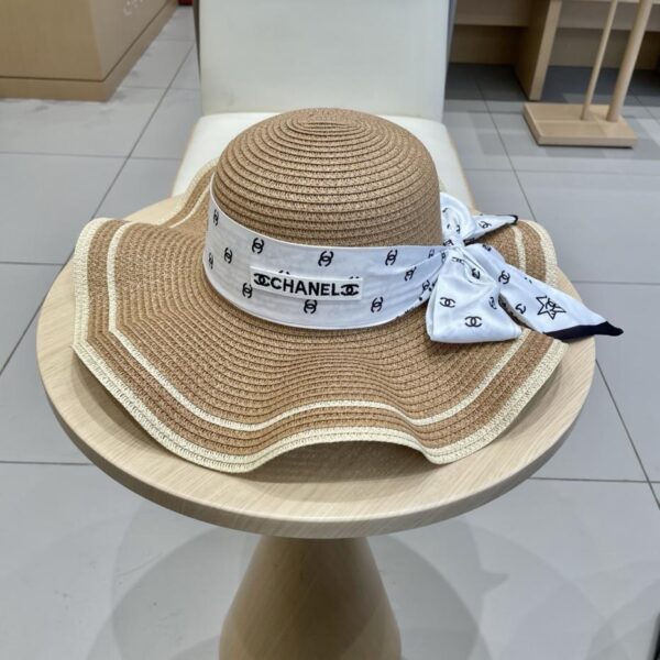 repliche,replica,perfette,siti di,affidabili,migliori siti,dove comprare,1:1,scarpe da ginnastica Cappello da sole a tesa ondulata con nastro di paglia Chanel