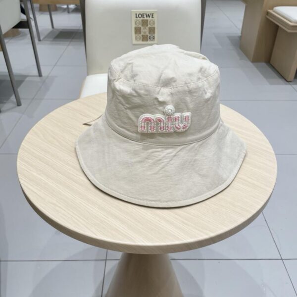 repliche,replica,perfette,siti di,affidabili,migliori siti,dove comprare,1:1,scarpe da ginnastica Il nuovo cappello da pescatore di Miu Miu