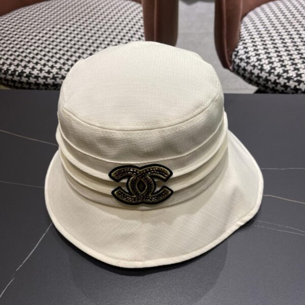 repliche,replica,perfette,siti di,affidabili,migliori siti,dove comprare,1:1,scarpe da ginnastica Chanel all’inizio della primavera nuovo elegante fiocco piccolo cappello da pescatore profumato