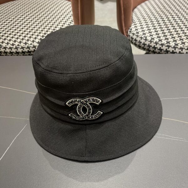 repliche,replica,perfette,siti di,affidabili,migliori siti,dove comprare,1:1,scarpe da ginnastica Chanel all’inizio della primavera nuovo elegante fiocco piccolo cappello da pescatore profumato