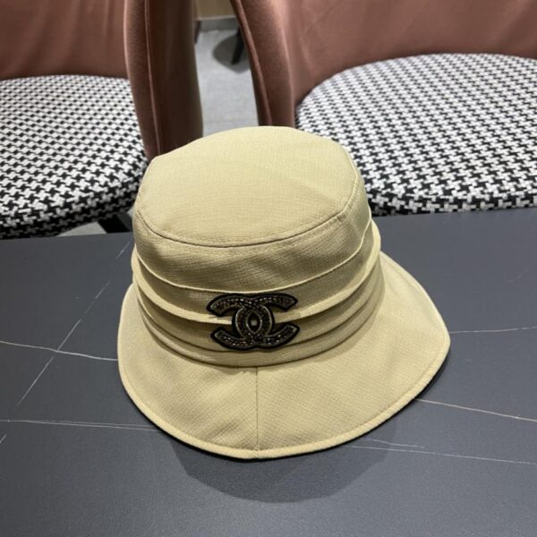 repliche,replica,perfette,siti di,affidabili,migliori siti,dove comprare,1:1,scarpe da ginnastica Chanel all’inizio della primavera nuovo elegante fiocco piccolo cappello da pescatore profumato