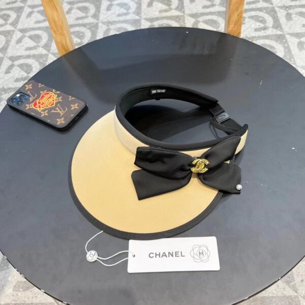 repliche,replica,perfette,siti di,affidabili,migliori siti,dove comprare,1:1,scarpe da ginnastica Cappello a cilindro vuoto estivo anti-UV di CHANEL