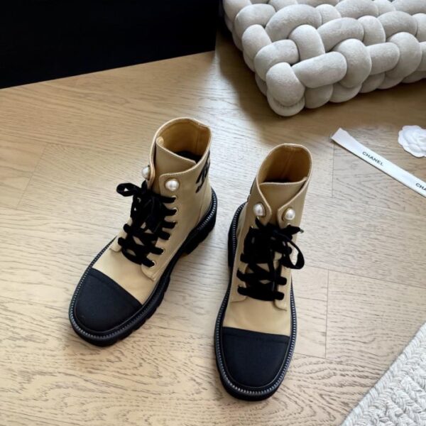repliche,replica,perfette,siti di,affidabili,migliori siti,dove comprare,1:1,scarpe da ginnastica Chanel 25k nuovi stivaletti Martin versione top (NXT4S)