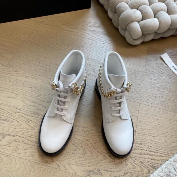 repliche,replica,perfette,siti di,affidabili,migliori siti,dove comprare,1:1,scarpe da ginnastica Chanel 25k autunno e inverno nuovi stivaletti in camoscio con catena versione top (RERJ9)