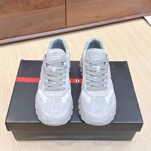 Sneakers casual da uomo Prada Re-Nylon con logo triangolare (XX7RC)