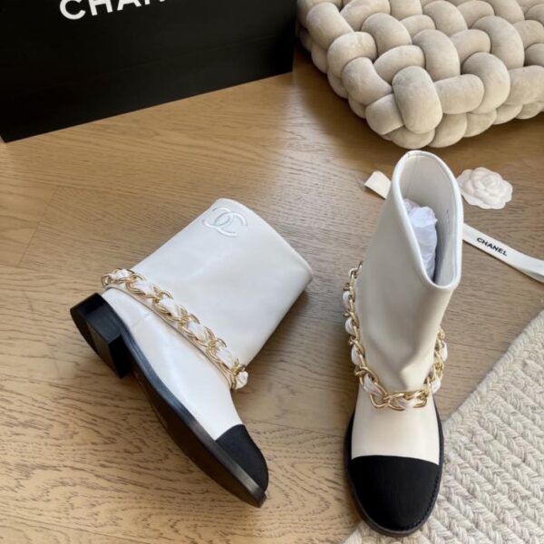 repliche,replica,perfette,siti di,affidabili,migliori siti,dove comprare,1:1,scarpe da ginnastica Nuovi stivali a catena Chanel nella versione top (FCCP9)