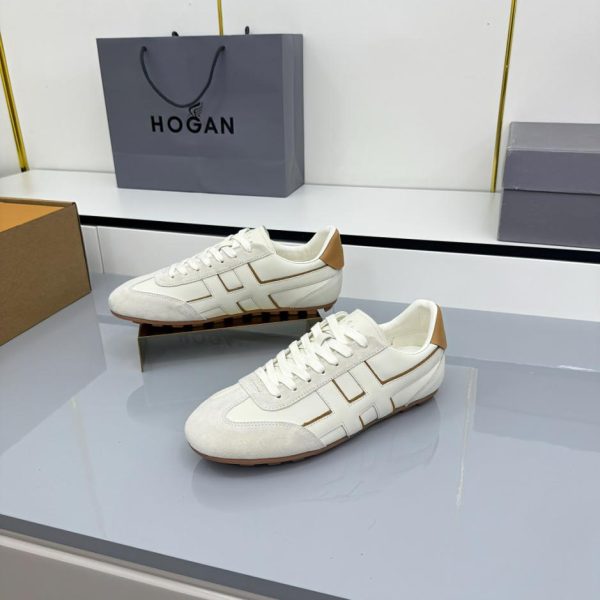L'ultimo aggiornamento di punta dello stile unisex da coppia di HOGAN: scarpe sportive unisex (ZA4SE)