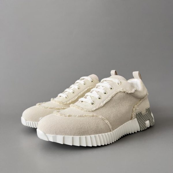 repliche,replica,perfette,siti di,affidabili,migliori siti,dove comprare,1:1,scarpe da ginnastica Scarpe casual basse con punta tonda e lacci in tela Bouncing di HERMES, bianco sporco, unisex (9GXS9)